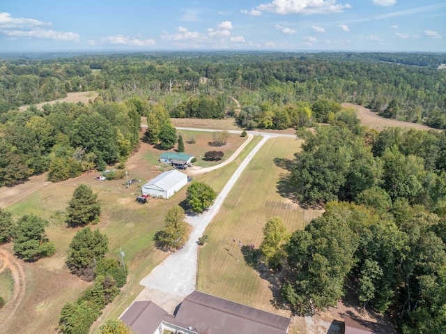 drone / aerial view with a forest view