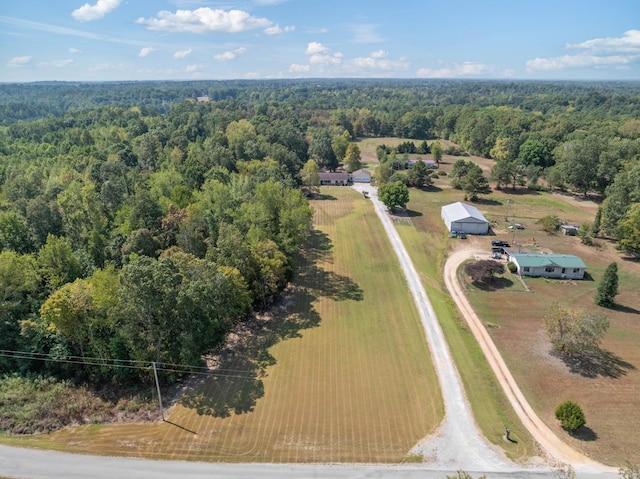 birds eye view of property with a rural view