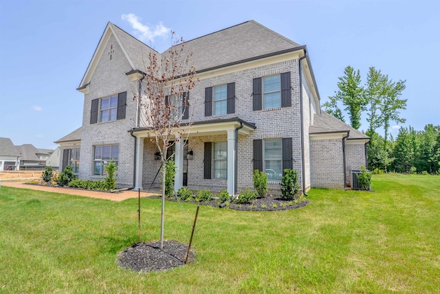 view of front of property with a front lawn