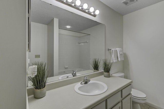 full bathroom with vanity, visible vents, tub / shower combination, a textured ceiling, and toilet