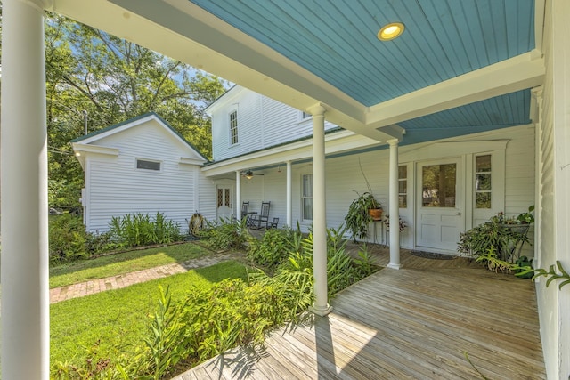 deck featuring a lawn