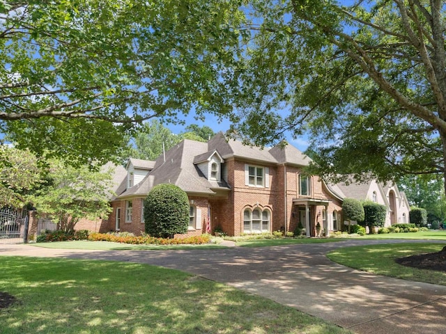 view of front of house with a front lawn