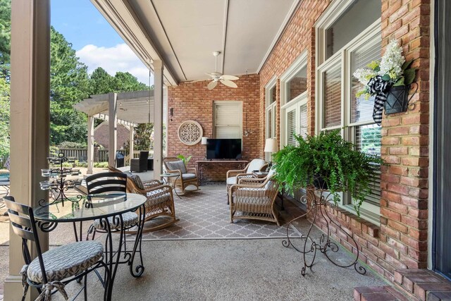 view of patio / terrace with ceiling fan, a pergola, and outdoor lounge area