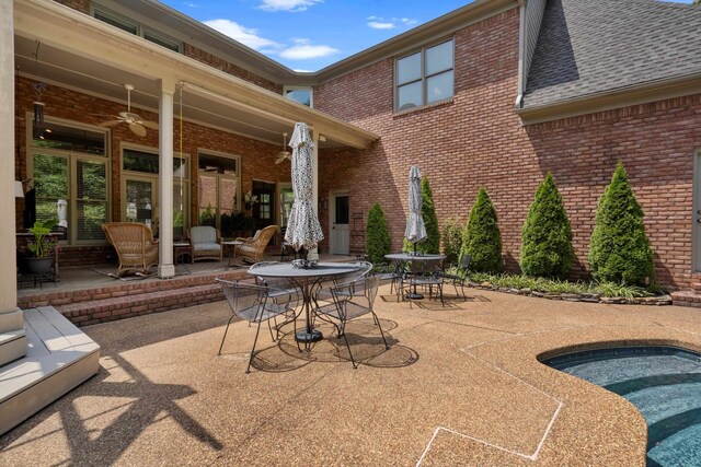 view of patio / terrace featuring ceiling fan