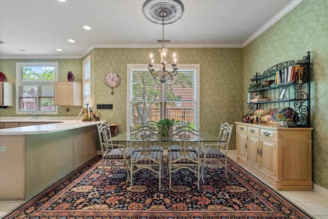 dining room featuring ornamental molding and an inviting chandelier