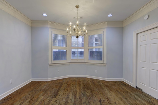 unfurnished room with dark wood-type flooring, a chandelier, and crown molding