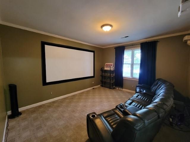 home theater room featuring ornamental molding