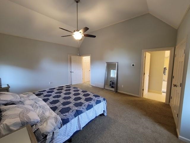 carpeted bedroom with high vaulted ceiling, ceiling fan, and ensuite bathroom