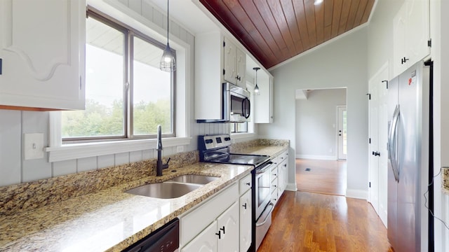 kitchen featuring hardwood / wood-style floors, wood ceiling, stainless steel appliances, white cabinetry, and sink