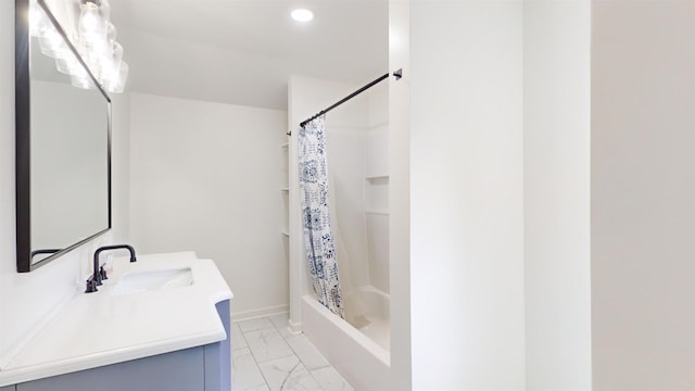 bathroom with vanity and shower / bath combo