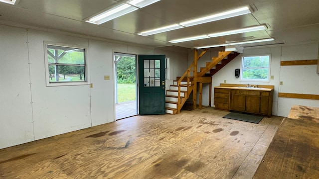 interior space featuring light wood-type flooring and sink