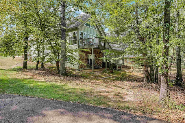 view of front of home with a deck