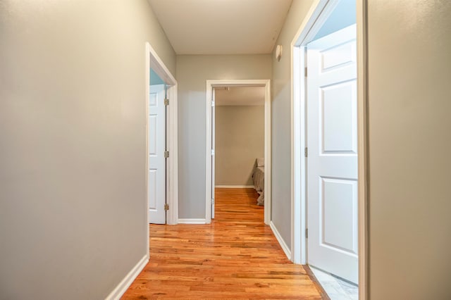 hallway featuring light hardwood / wood-style floors