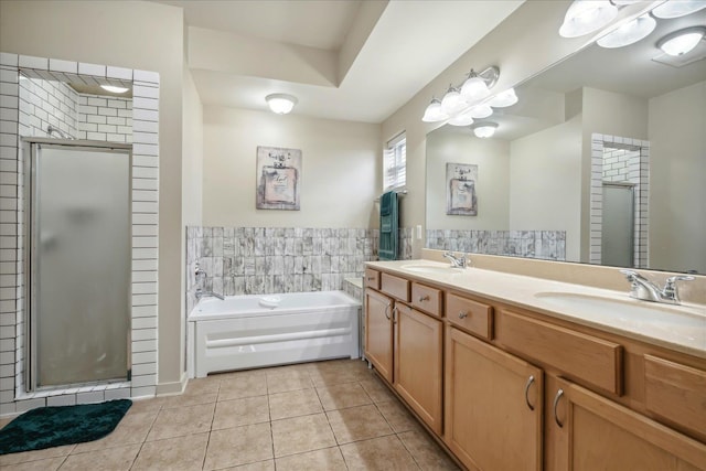 bathroom featuring vanity, separate shower and tub, and tile patterned flooring