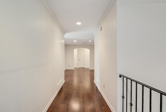 corridor with crown molding and dark hardwood / wood-style floors