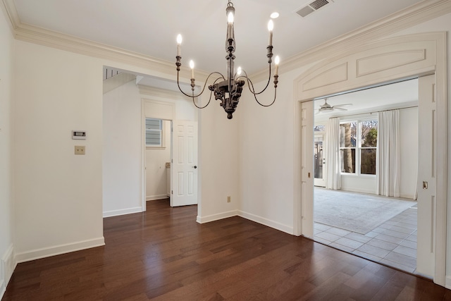 unfurnished dining area featuring ornamental molding, ceiling fan with notable chandelier, and dark hardwood / wood-style flooring