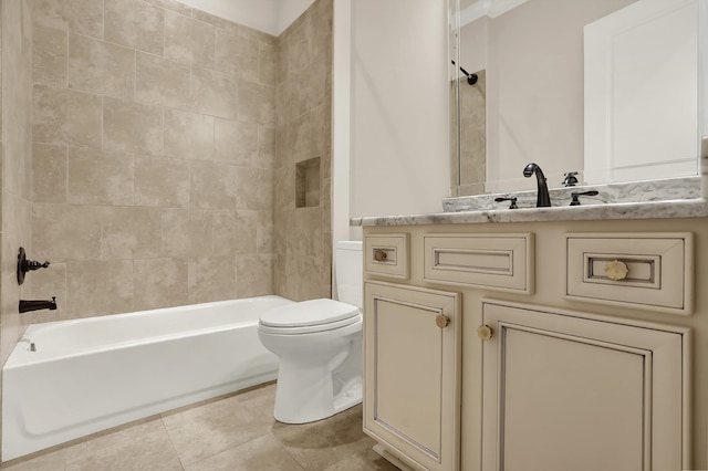 full bathroom featuring vanity, tiled shower / bath combo, toilet, and tile patterned floors