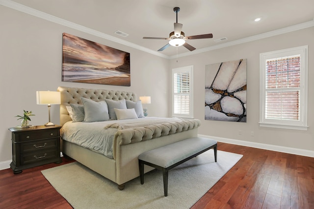 bedroom with ceiling fan, dark hardwood / wood-style floors, and ornamental molding