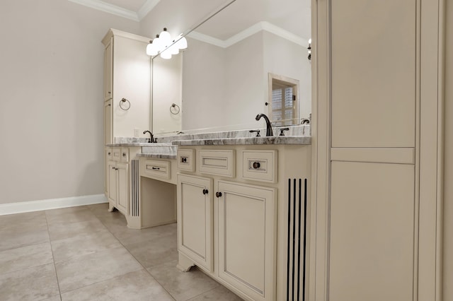 bathroom featuring ornamental molding, tile patterned flooring, and vanity