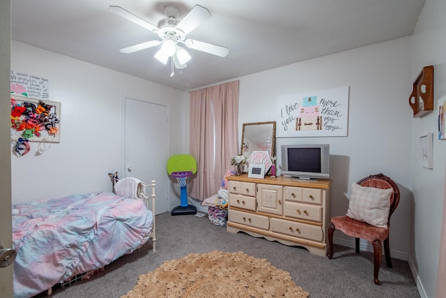 bedroom with ceiling fan and carpet