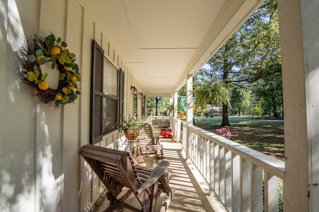 balcony featuring a porch