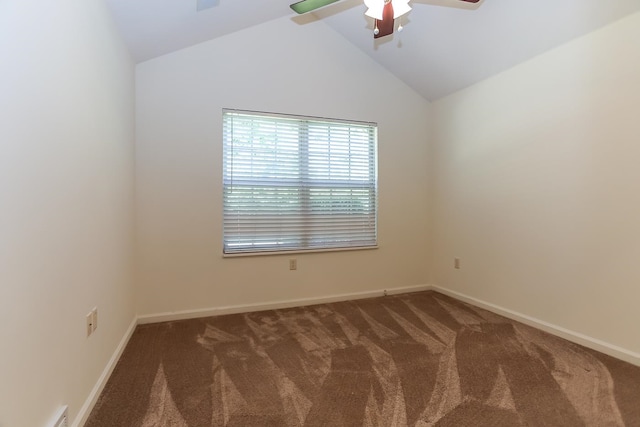 carpeted spare room featuring ceiling fan and high vaulted ceiling