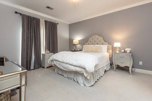 carpeted bedroom featuring ornamental molding