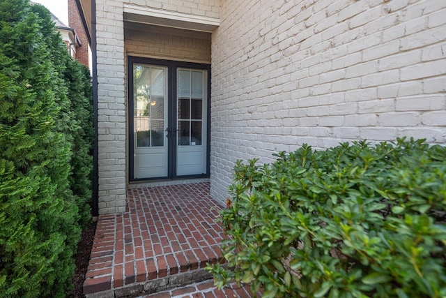 1911 Hazelton Dr, Germantown, TN 38138 - property entrance with french doors and brick siding