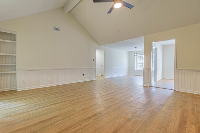 unfurnished living room featuring ceiling fan and light hardwood / wood-style flooring