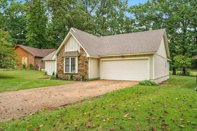 view of front of home featuring a garage and a front lawn