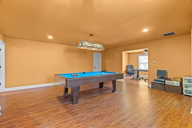 game room with wood-type flooring and billiards