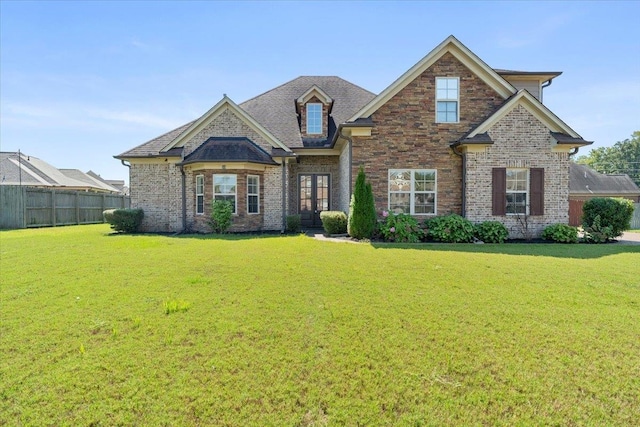 view of front facade featuring a front yard