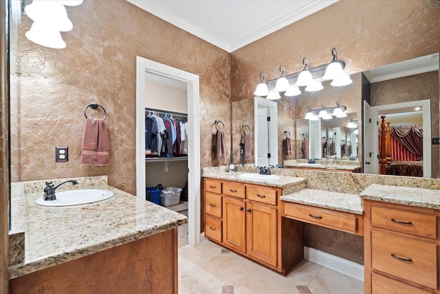 bathroom with vanity, crown molding, and tile patterned floors