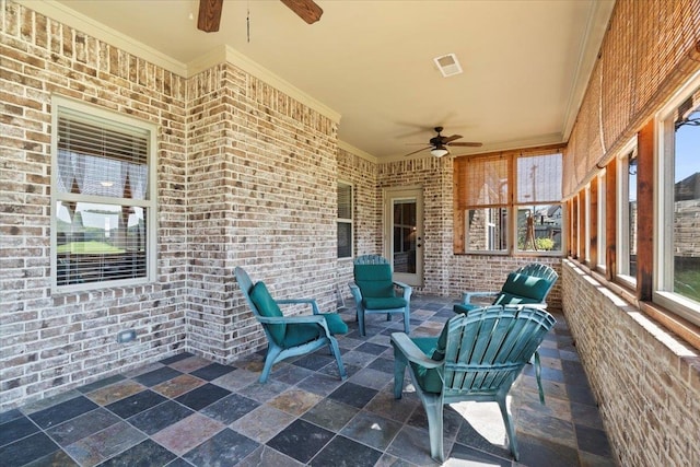 view of patio / terrace with ceiling fan