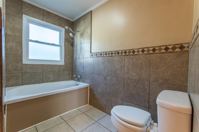 bathroom with bathtub / shower combination, tile patterned floors, tile walls, crown molding, and toilet