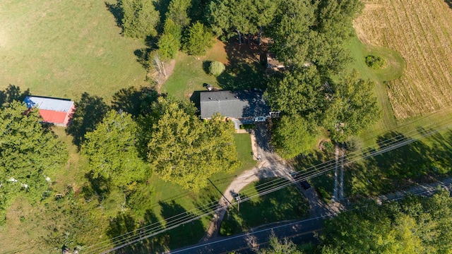 birds eye view of property with a rural view