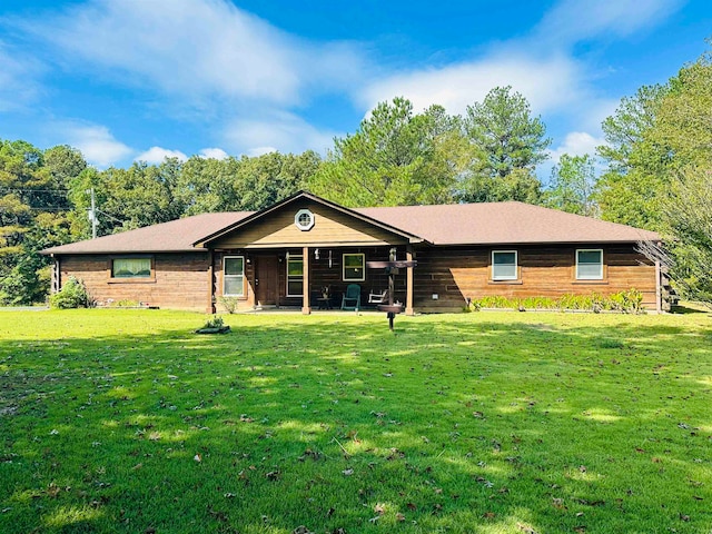 single story home with a front yard