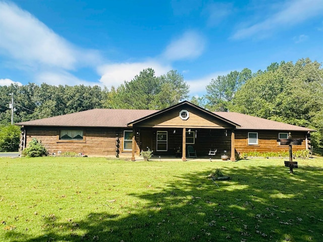 view of front of property with a front lawn