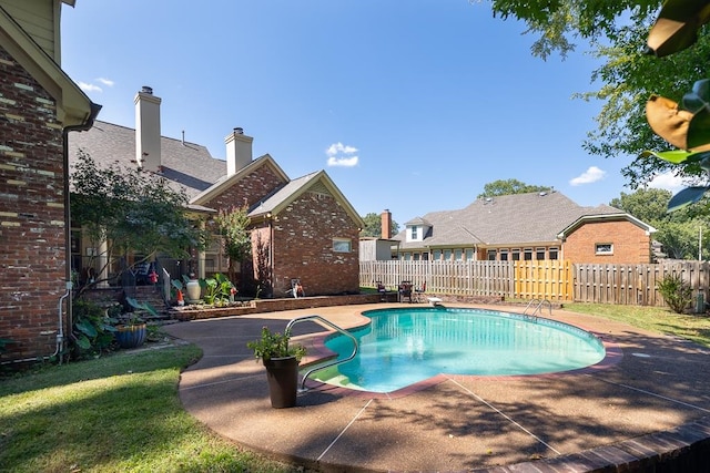 view of pool featuring a patio