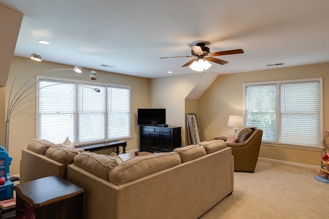 carpeted living room featuring ceiling fan