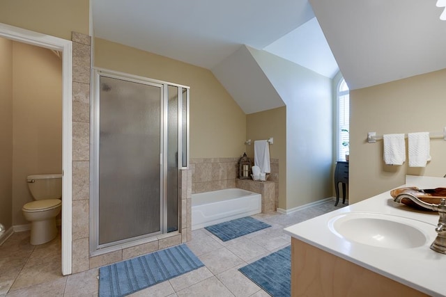 full bathroom with tile patterned floors, vanity, vaulted ceiling, shower with separate bathtub, and toilet