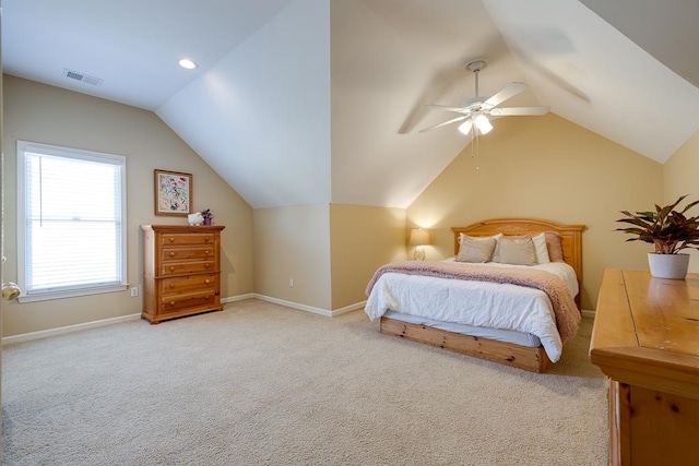 bedroom featuring ceiling fan, light colored carpet, and lofted ceiling