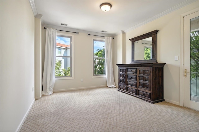 carpeted bedroom featuring access to outside and crown molding