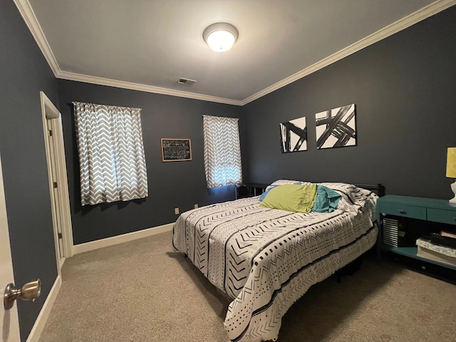 bedroom with crown molding and carpet