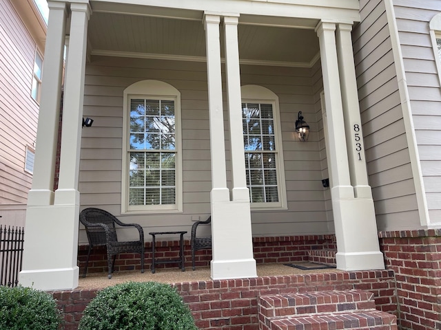 entrance to property with covered porch