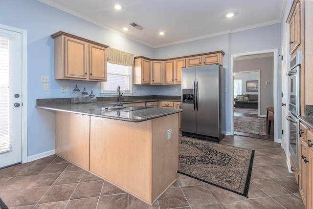 kitchen featuring crown molding, kitchen peninsula, sink, and stainless steel appliances