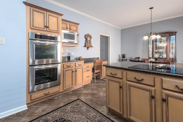 kitchen featuring an inviting chandelier, stainless steel appliances, hanging light fixtures, and ornamental molding