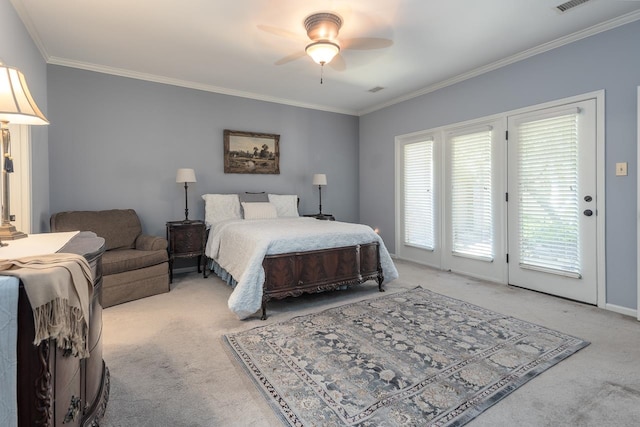 carpeted bedroom featuring ceiling fan, ornamental molding, and access to outside