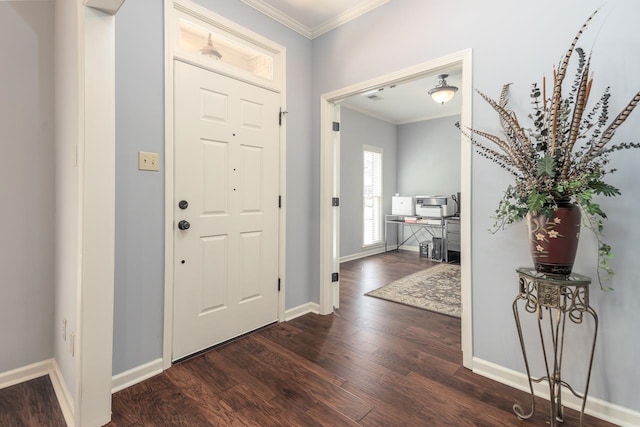 foyer featuring dark hardwood / wood-style floors and crown molding