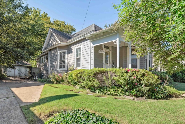 view of home's exterior with a lawn